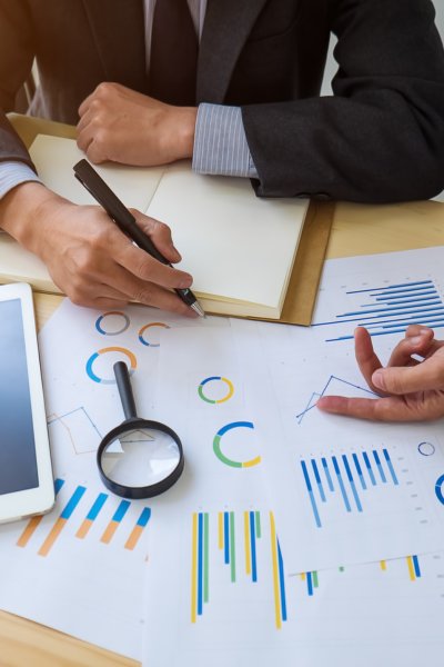 Engineer with safety gear performing an audit